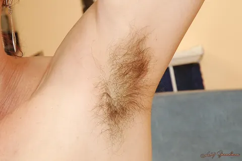 Thick Mature Redhead Strips Off Her Skirt to Show Hairy Armpits and Bush – photo 15 of 16