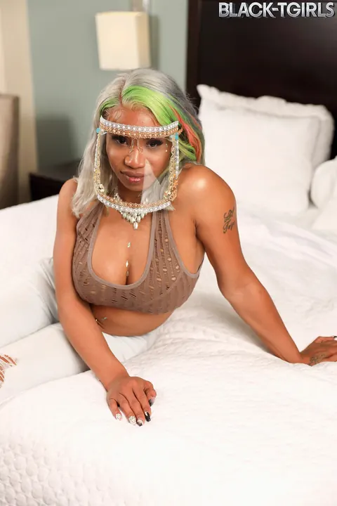 Ebony Trans Woman Shows Off Her Hard Cock in the Bedroom – photo 1 of 16