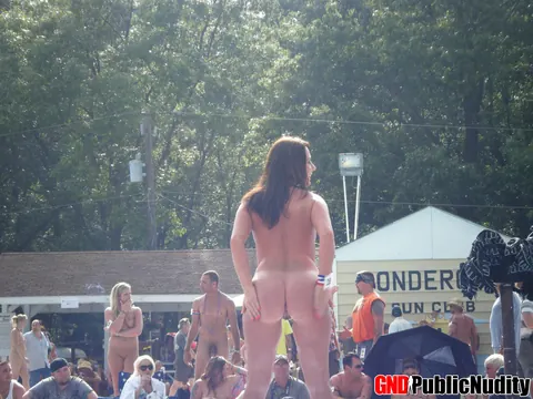 Busty Brunette Strips Out of Her Bikini in Public – photo 1 of 12