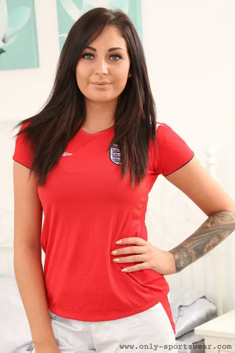 European Woman Strips Out of Her Soccer Uniform – photo 1 of 21