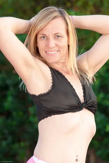 Thick Mature Blonde Flashes White Panties by the Pool