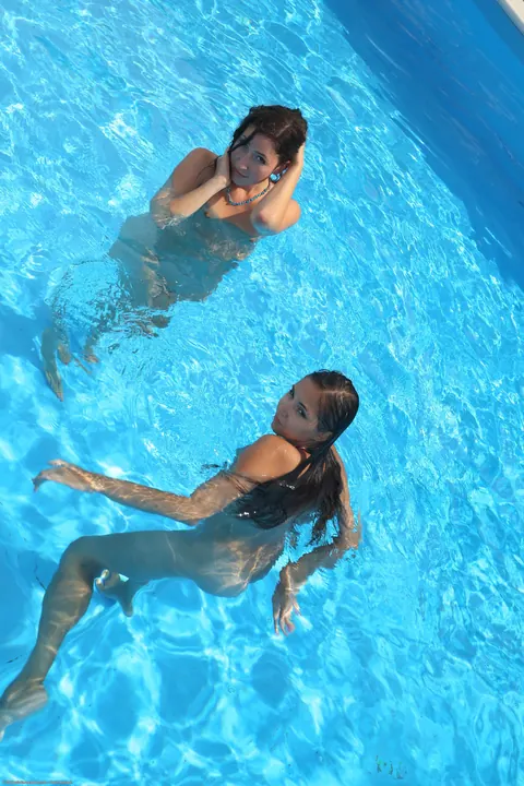 Jay Dee: Brunette and Redhead Lesbians Kiss by the Pool Outdoors – photo 1 of 21
