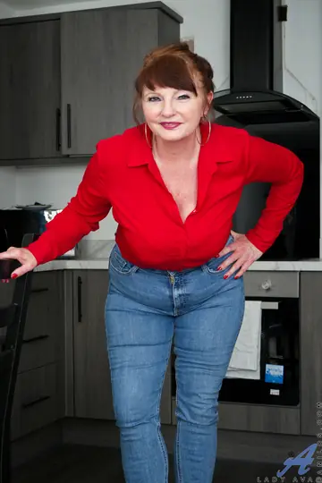 Mature Redhead Undresses Out of Her Lingerie in the Kitchen