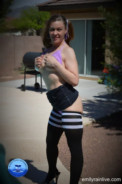 Emily Rain: Busty Brunette MILF in Pigtails and Stockings Strips Poolside – photo 8 of 14