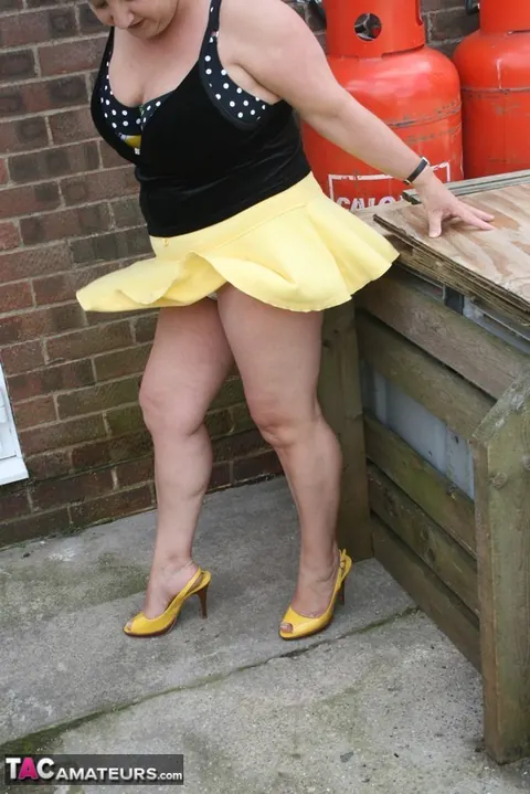 Kinky Carol: Curvy British Brunette Flashes Bikini and Panties on Patio – photo 10 of 16