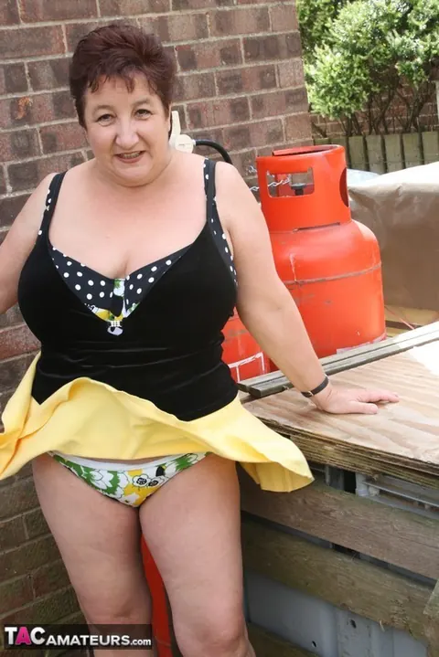 Kinky Carol: Curvy British Brunette Flashes Bikini and Panties on Patio – photo 7 of 16