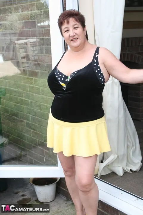 Kinky Carol: Curvy British Brunette Flashes Bikini and Panties on Patio – photo 4 of 16