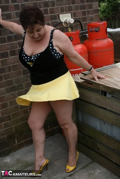 Kinky Carol: Curvy British Brunette Flashes Bikini and Panties on Patio – photo 9 of 16