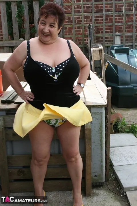 Kinky Carol: Curvy British Brunette Flashes Bikini and Panties on Patio – photo 14 of 16
