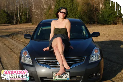 Sabrina Squirts: Brunette PAWG with Glasses Spreads on a Car – photo 1 of 12