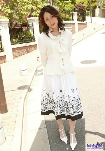 Japanese Woman Masturbates in a Skirt and Stockings Outdoors Before Doggy Sex