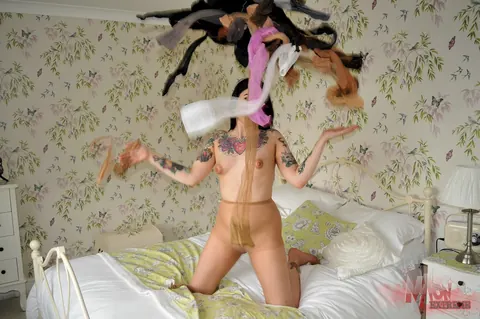 Tattooed Brunette in Pantyhose Pulls Crotch Aside to Finger Herself – photo 3 of 15