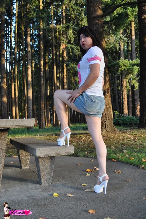 Curvy Trans Woman Shows Her Long Legs in a Miniskirt and Heels Outdoors – photo 2 of 16