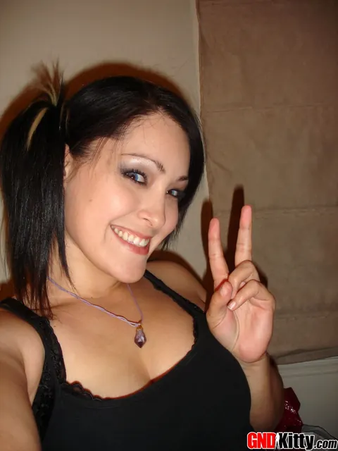 Thick Asian Brunette in Pigtails Shows Her Ass in Shorts Selfie – photo 3 of 12