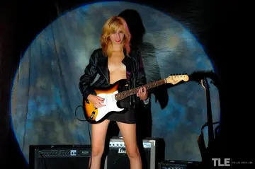 Blonde Latina Strips Out of Her Leather Skirt and Spreads