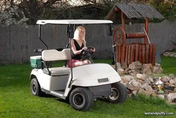 Blonde Pulls Shorts Aside and Fingers Her Pussy on a Golf Cart
