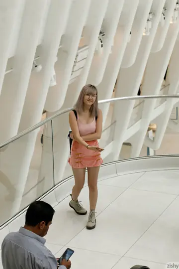 Asian Brunette Lifts Her Skirt and Spreads in Public
