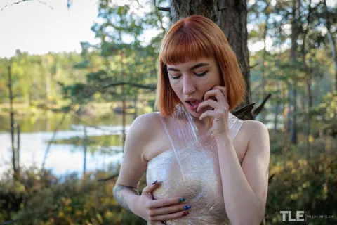 Lilly Mays: Tall Redhead in Stockings Fingers Her Pussy in the Forest – photo 4 of 16