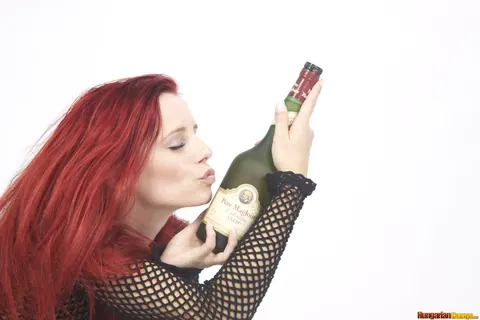 Ariel Piper Fawn: Hungarian Redhead Shows Off Her Big Tits and Poses with a Bottle – photo 14 of 21