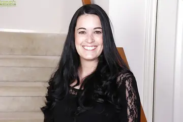 Busty Brunette MILF Strips Out of Her Pantyhose and Panties in Heels