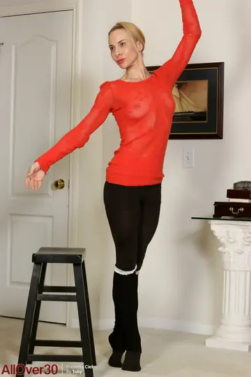 MILF Undresses and Spreads Her Pussy Wide for the Camera
