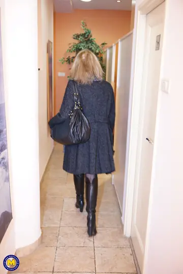 Thick Short-Haired MILF Strips in the Bathroom and Sauna