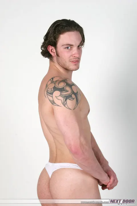 Thick Tattooed Man Shows Off His Muscles and Small Cock – photo 13 of 20