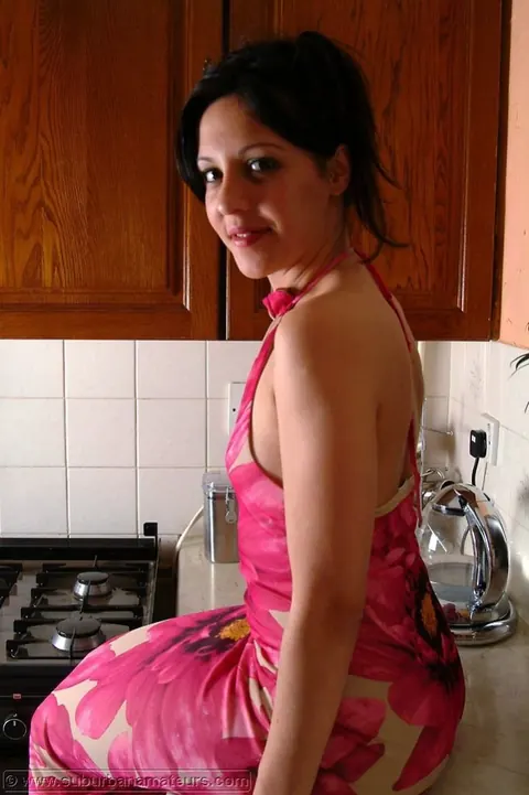 European Brunette Uses a Dildo on the Kitchen Counter – photo 4 of 21