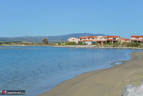 Nudechrissy: European Blonde Flaunts Her Huge Tits on the Beach – photo 19 of 20