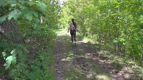 European in Glasses Lowers Yoga Pants to Pee on the Forest Path – photo 15 of 15