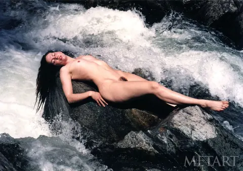 Woman Undresses and Poses Nude Arching Her Back – photo 8 of 21