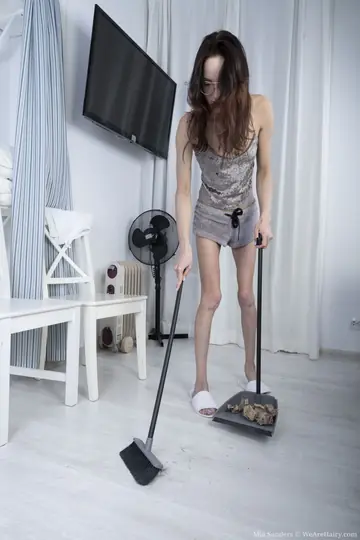 Slim Russian Brunette Reveals Her Hairy Pussy and Fingers Deep