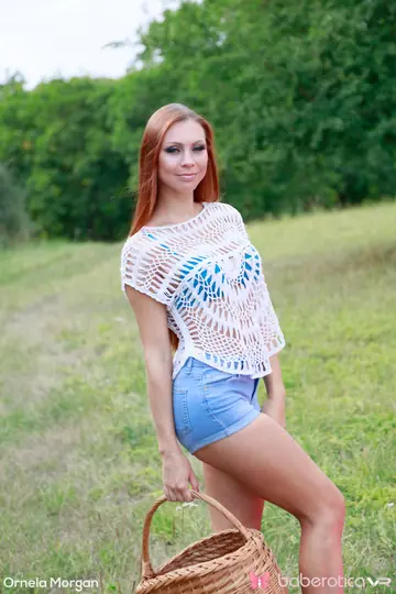 Redhead Undresses and Masturbates with a Dildo on a Forest Blanket