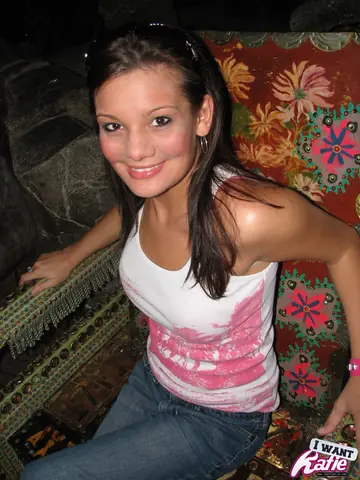 Brunette with Big Enhanced Tits Flashes Her Chest in Jeans