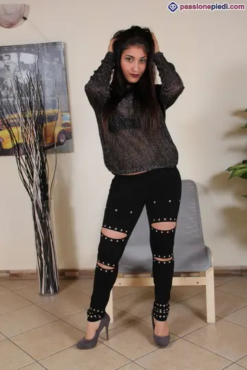 European Brunette Unbuckles Heels to Show Her Painted Toes