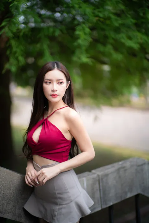 Busty Asian Brunette Shows Her Legs in a Miniskirt and Heels Outdoors – photo 5 of 20