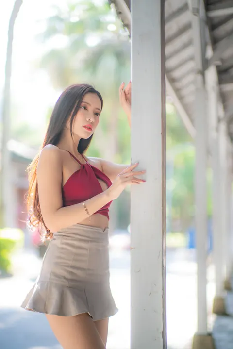 Busty Asian Brunette Shows Her Legs in a Miniskirt and Heels Outdoors – photo 13 of 20
