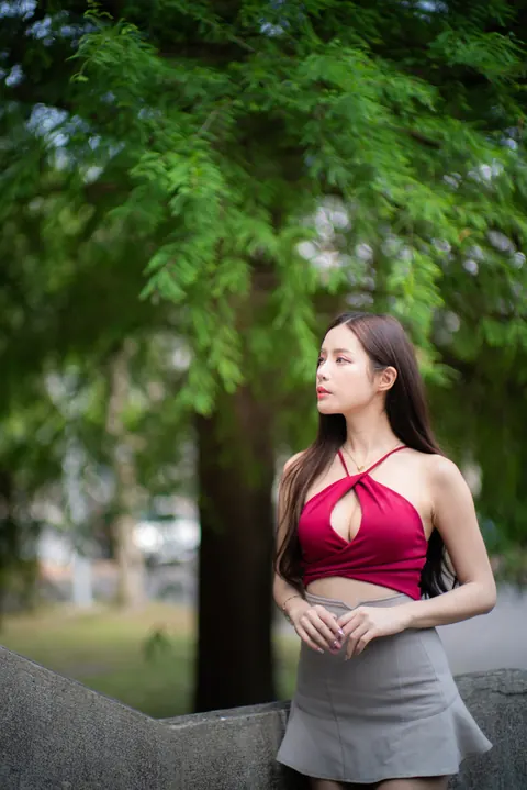 Busty Asian Brunette Shows Her Legs in a Miniskirt and Heels Outdoors – photo 2 of 20