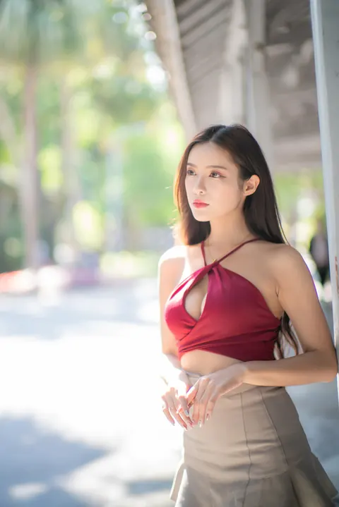 Busty Asian Brunette Shows Her Legs in a Miniskirt and Heels Outdoors – photo 16 of 20