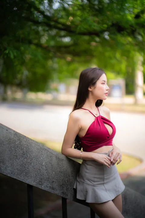 Busty Asian Brunette Shows Her Legs in a Miniskirt and Heels Outdoors – photo 7 of 20