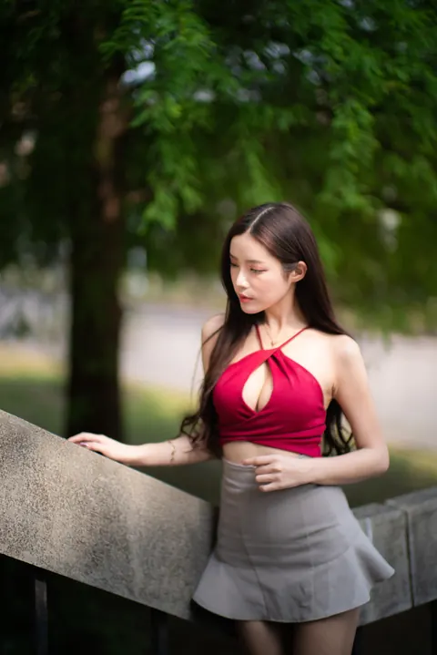 Busty Asian Brunette Shows Her Legs in a Miniskirt and Heels Outdoors – photo 3 of 20