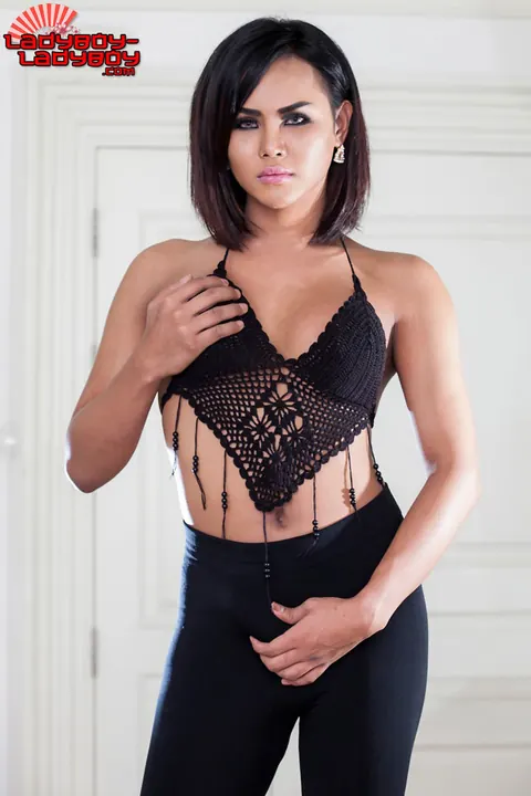 Trans Woman Strips Nude and Poses Front and Back for the Camera – photo 2 of 15