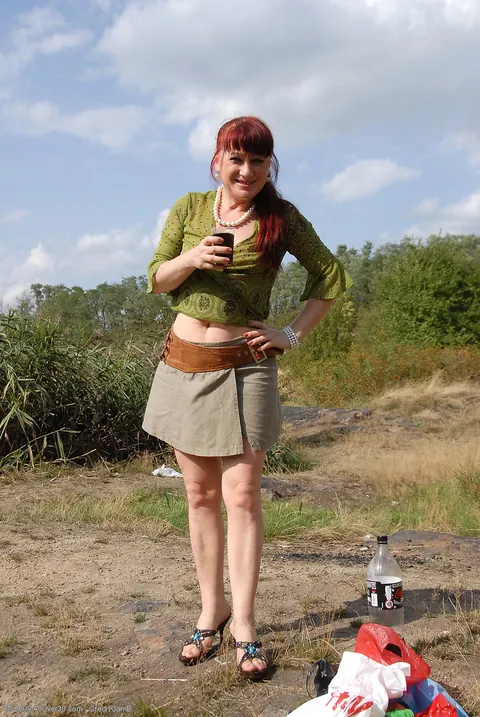 Busty Mature Redhead Spreads Her Legs Outdoors – photo 1 of 20