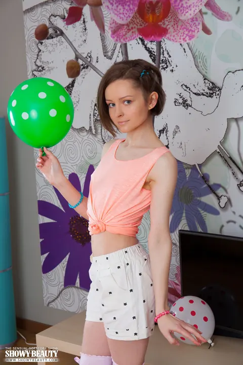Skinny Woman Pulls Down Her Panties and Spreads Her Legs in Socks – photo 1 of 20