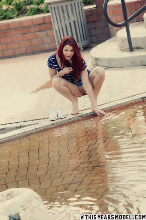 Mindy Corin: Busty Redhead Pulls Aside Her Panties in a Public Park – photo 12 of 15