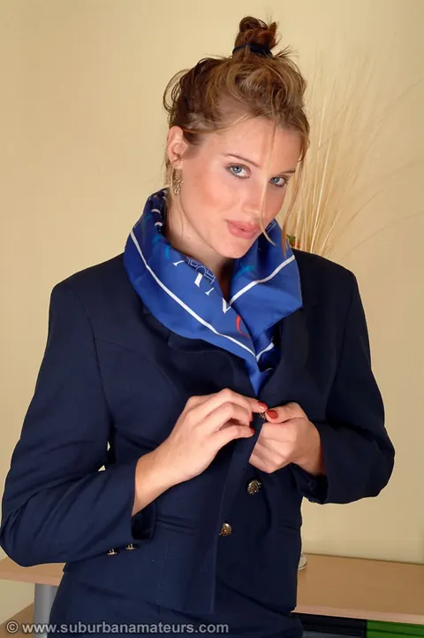 Tall British MILF Strips Off Her Uniform and Shows Her Hairy Bush – photo 2 of 20