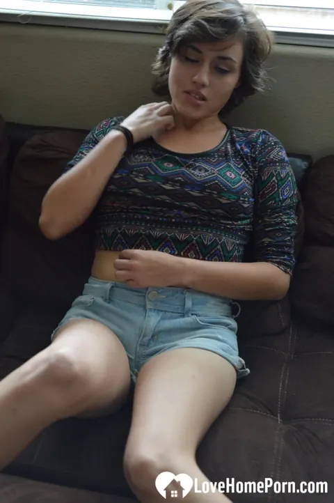 Short-Haired Skinny Brunette Babe Masturbates with a Dildo on the Sofa – photo 3 of 20