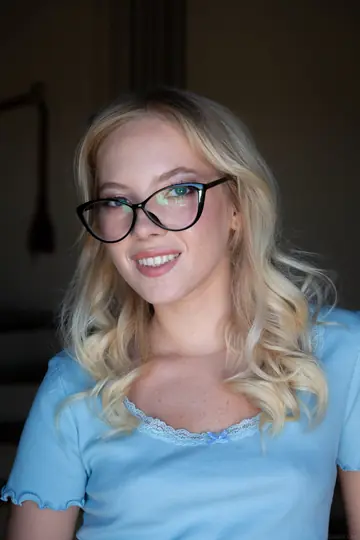 Blonde Model Strips and Poses in Glamour Gallery
