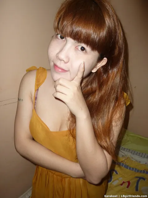 Redhead Asian Trans Woman Strips and Strokes Her Cock – photo 1 of 17