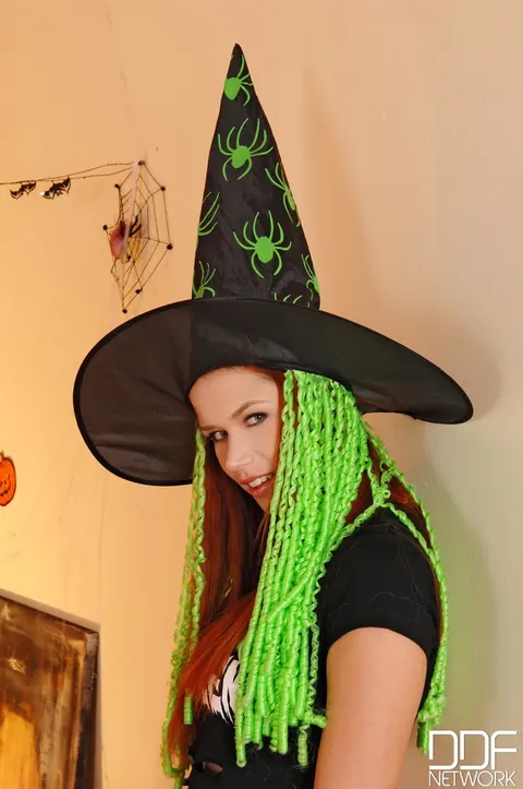 Redhead Strips Off Her Halloween Witch Costume to Bikini Then Spreads Nude – photo 1 of 21